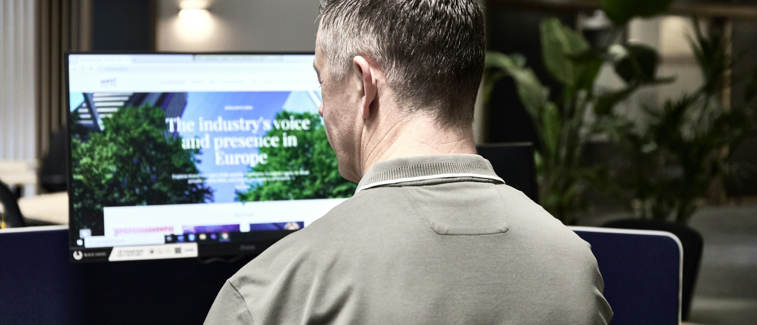 A man peruses a corporate website